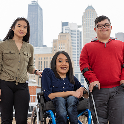 Group shot of young adults with disabilities in front of Chicago skyline